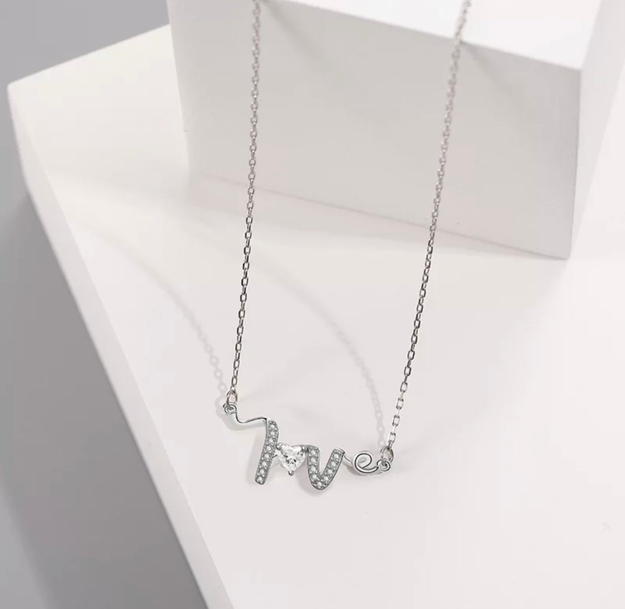 “I Wear Love On” Necklace by Intricata co.