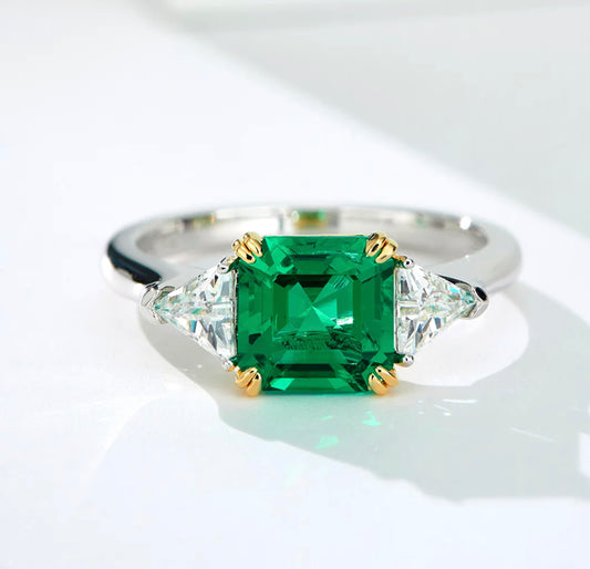 Three-stone Emerald Ring by Intricata co.