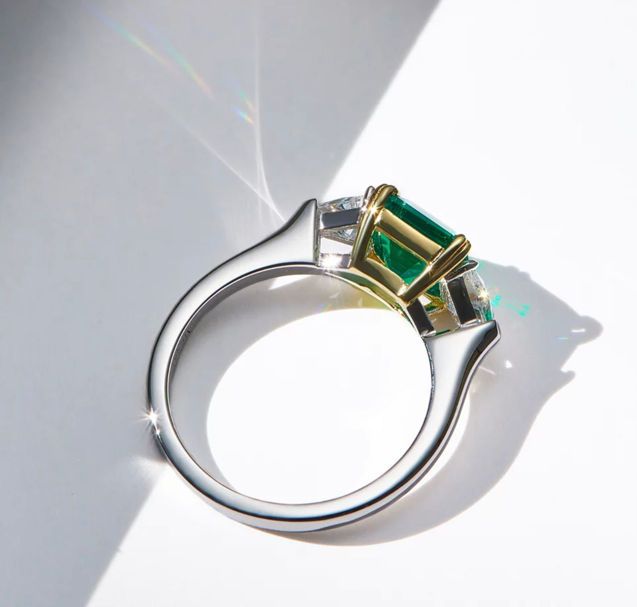 Three-stone Emerald Ring by Intricata co.