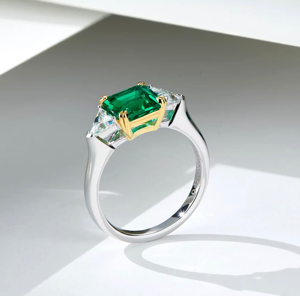 Three-stone Emerald Ring by Intricata co.