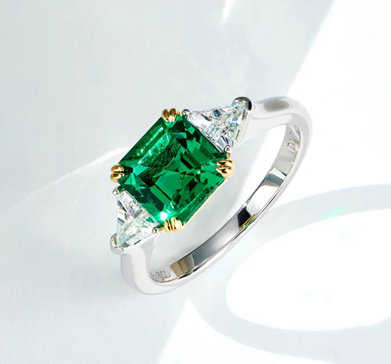 Three-stone Emerald Ring by Intricata co.