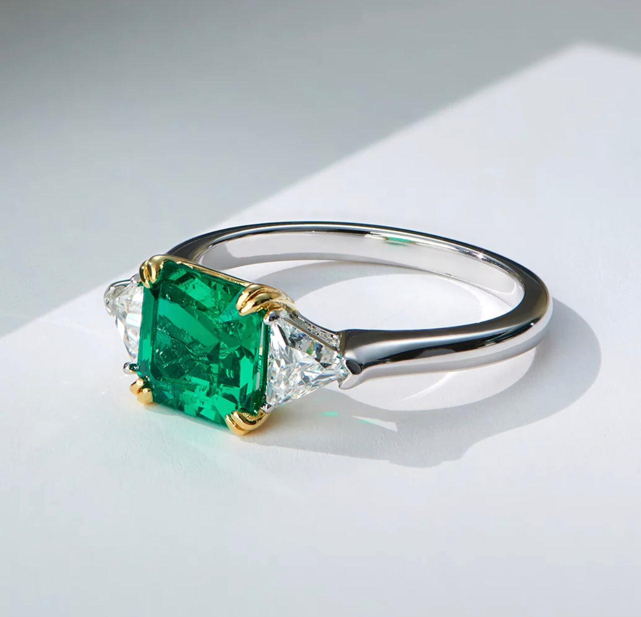 Three-stone Emerald Ring by Intricata co.