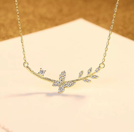 The Butterfly on a twig necklace by Intricata co.