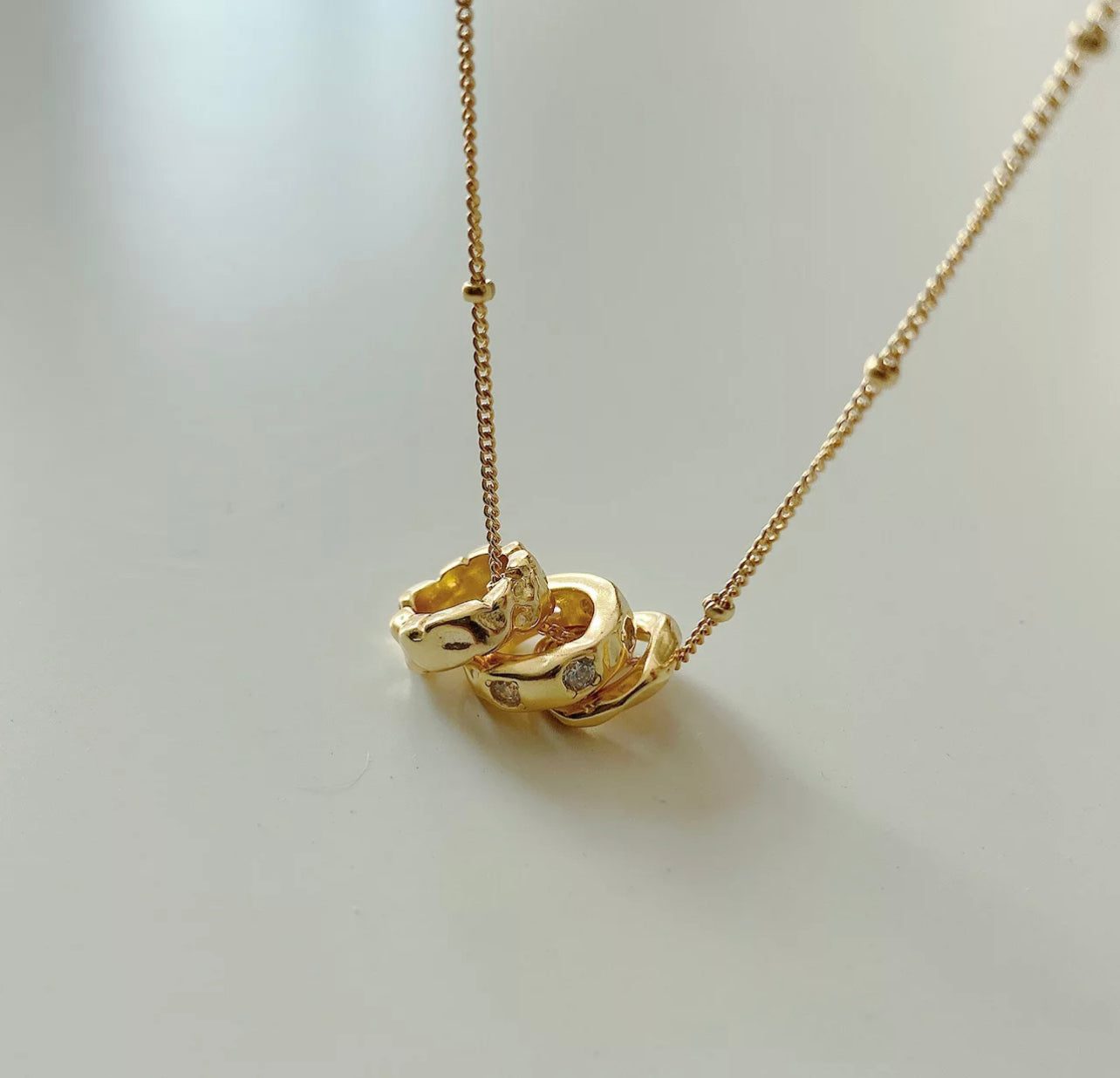 Three Mighty Rings Necklace by Intricata co.